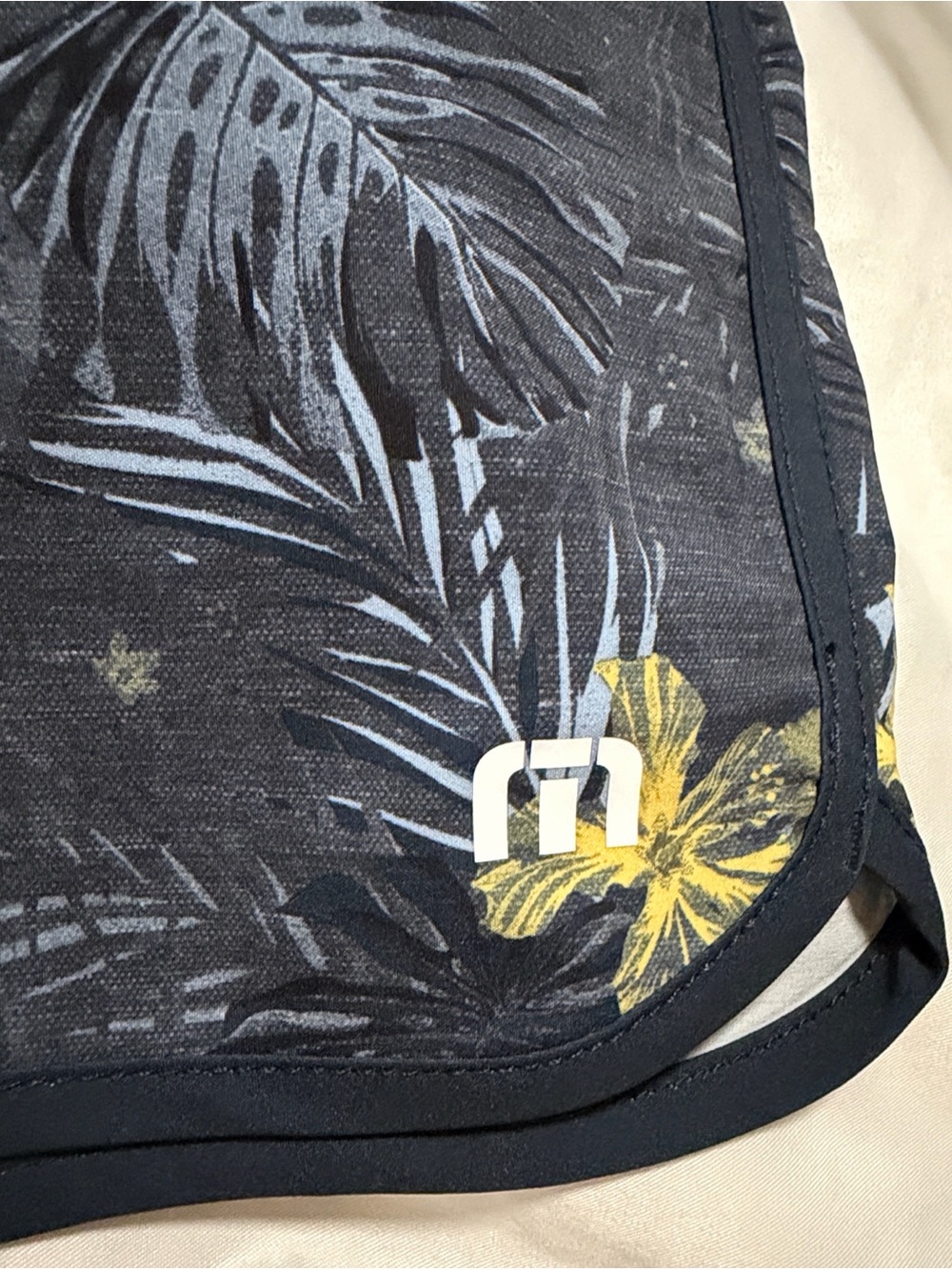 Travis Mathew Navy Floral Swim Board Shorts with Yellow Accents - Picture 6 of 7